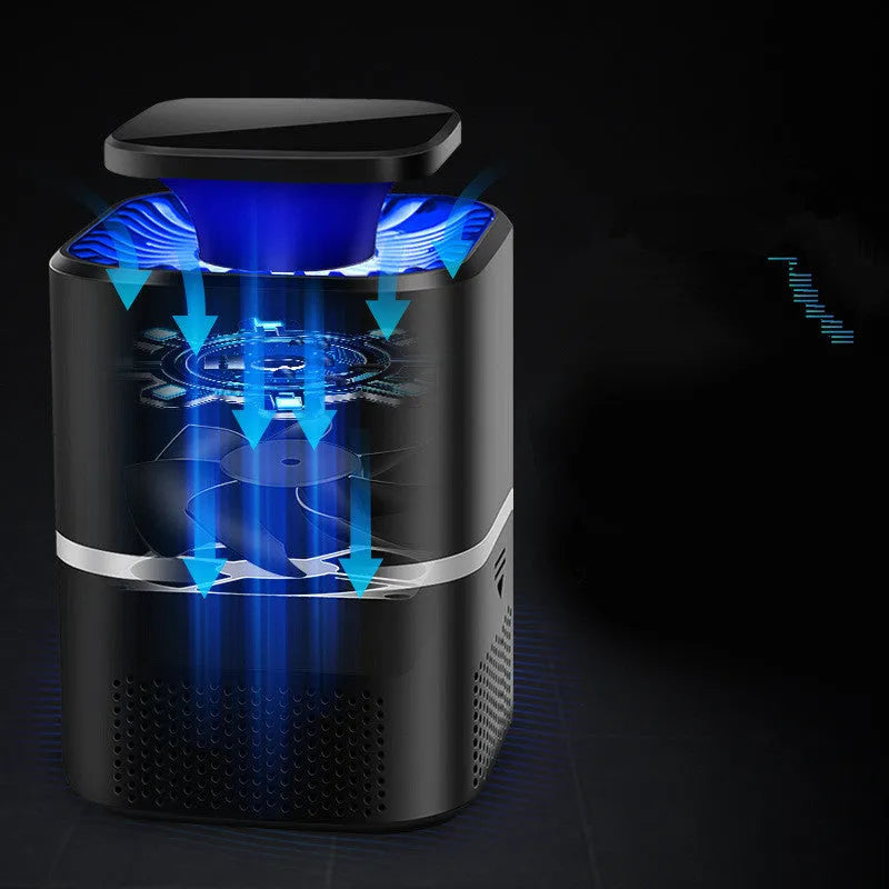 White ultimate version photocatalyst mosquito killer with blue light on a flat surface, USB cable attached