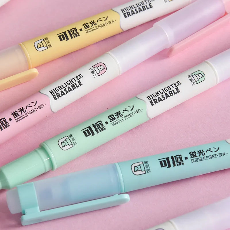 Set of six double-headed fluorescent graffiti marker pens with plastic shells and assorted colours