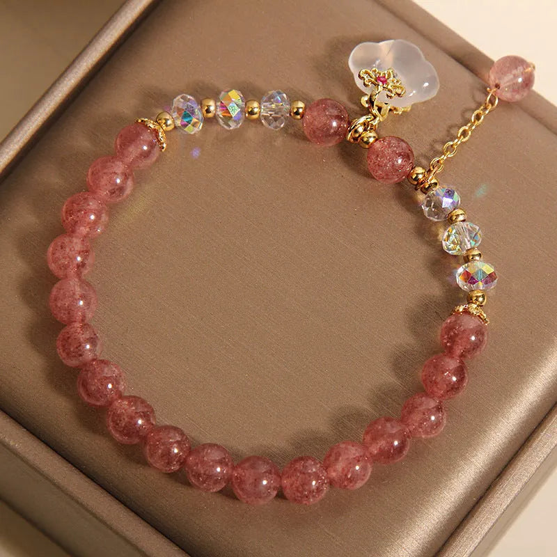 Women's natural crystal bracelet with strawberry quartz beads, white agate beads, and traditional auspicious cloud charm