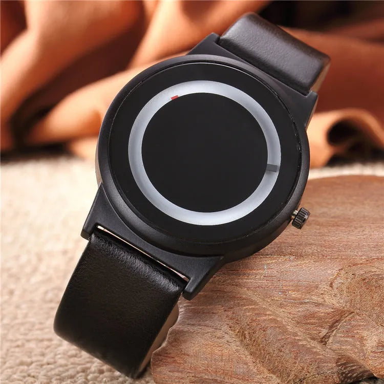 Neutral casual quartz watch with round 38mm dial, black strap, and alloy case on a plain background