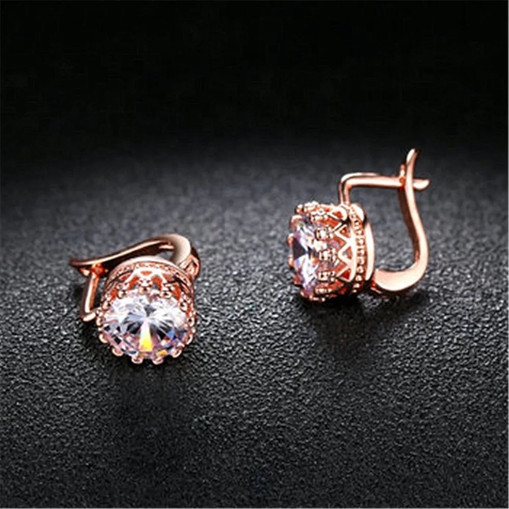 Korean retro style crown-shaped clip-on earrings with white diamond accents on a rose gold or white gold coloured finish.