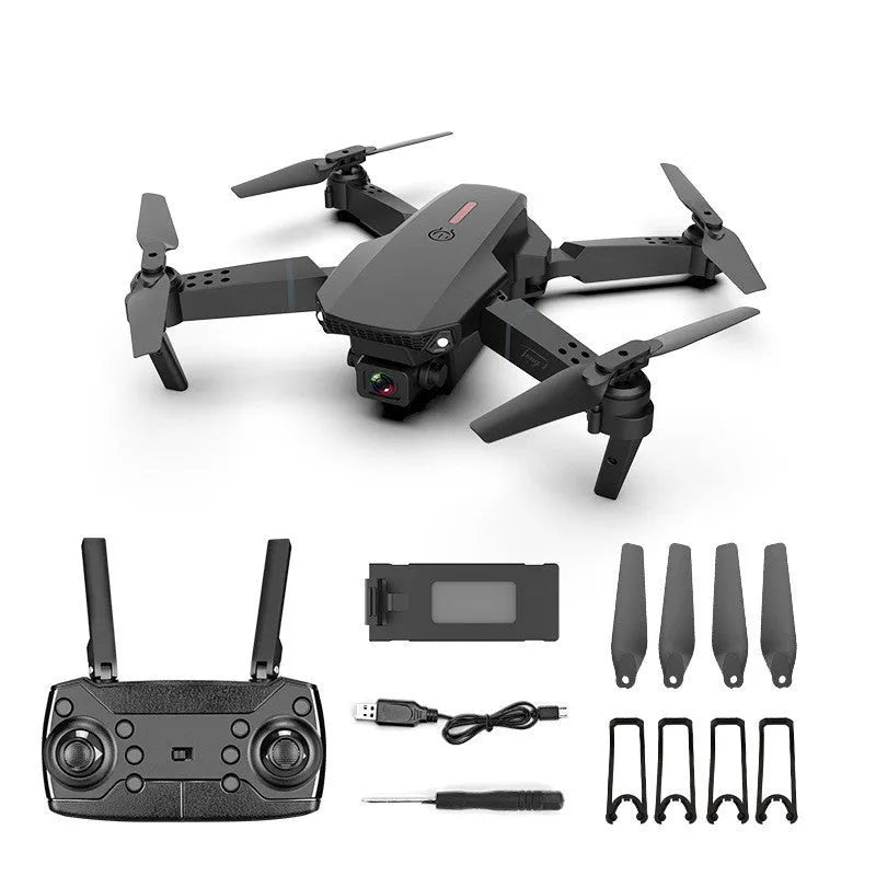 Grey foldable remote control drone with dual 4K cameras, LED lights, and a handheld transmitter.