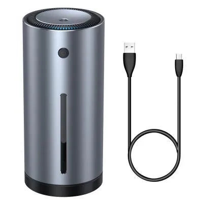 Black aluminium alloy car humidifier and air purifier with USB cable on a car dashboard