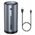 Black aluminium alloy car humidifier and air purifier with USB cable on a car dashboard