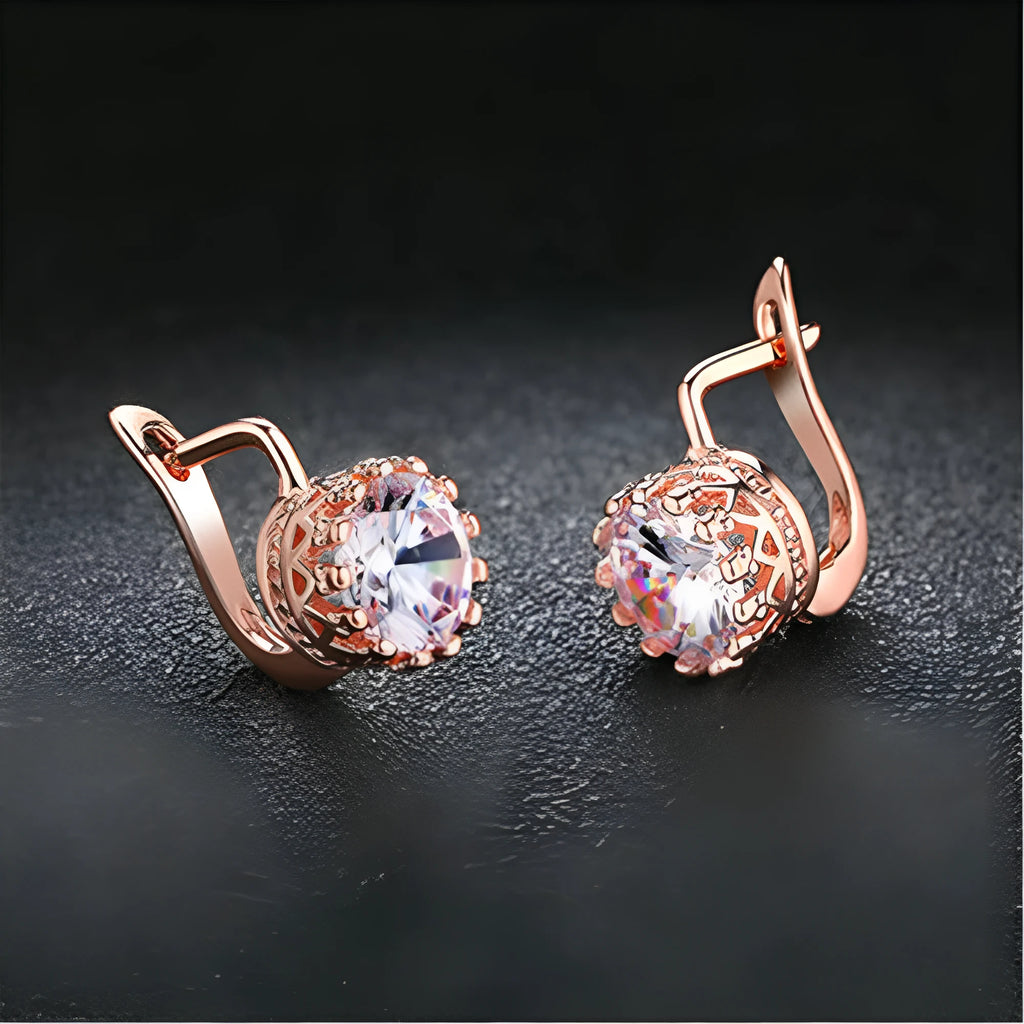 Korean retro style crown-shaped clip-on earrings with white diamond accents on a rose gold or white gold coloured finish.