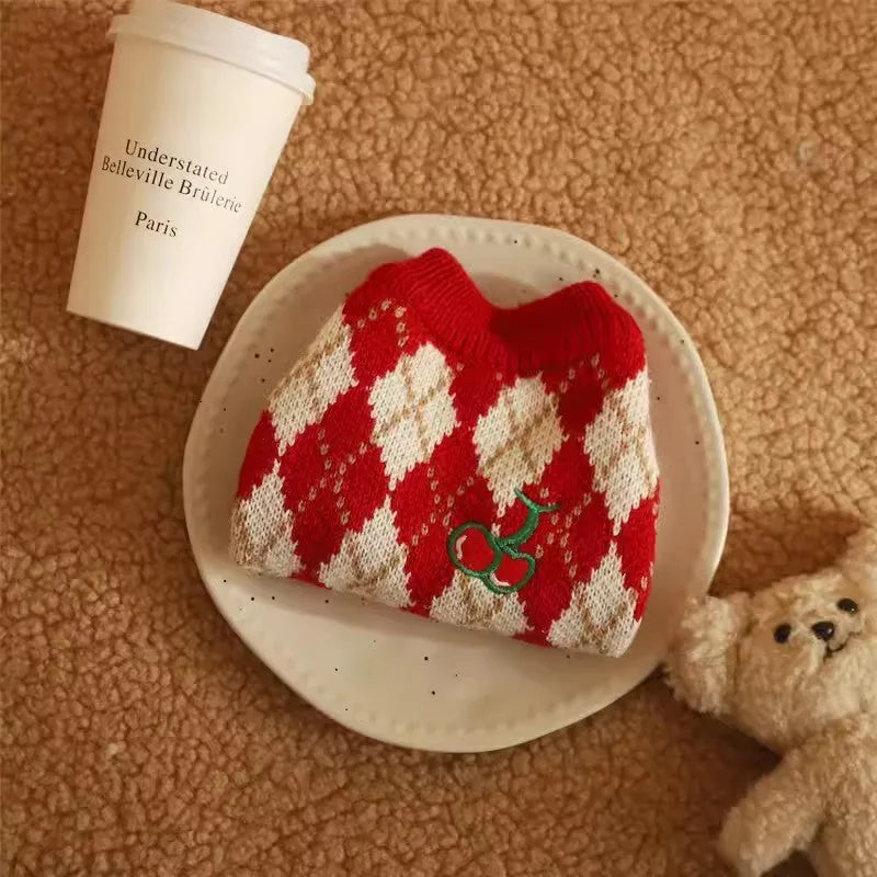 Red cat sweater with rhombic diamond embroidery pattern, a knitted polyester jumper for pets.