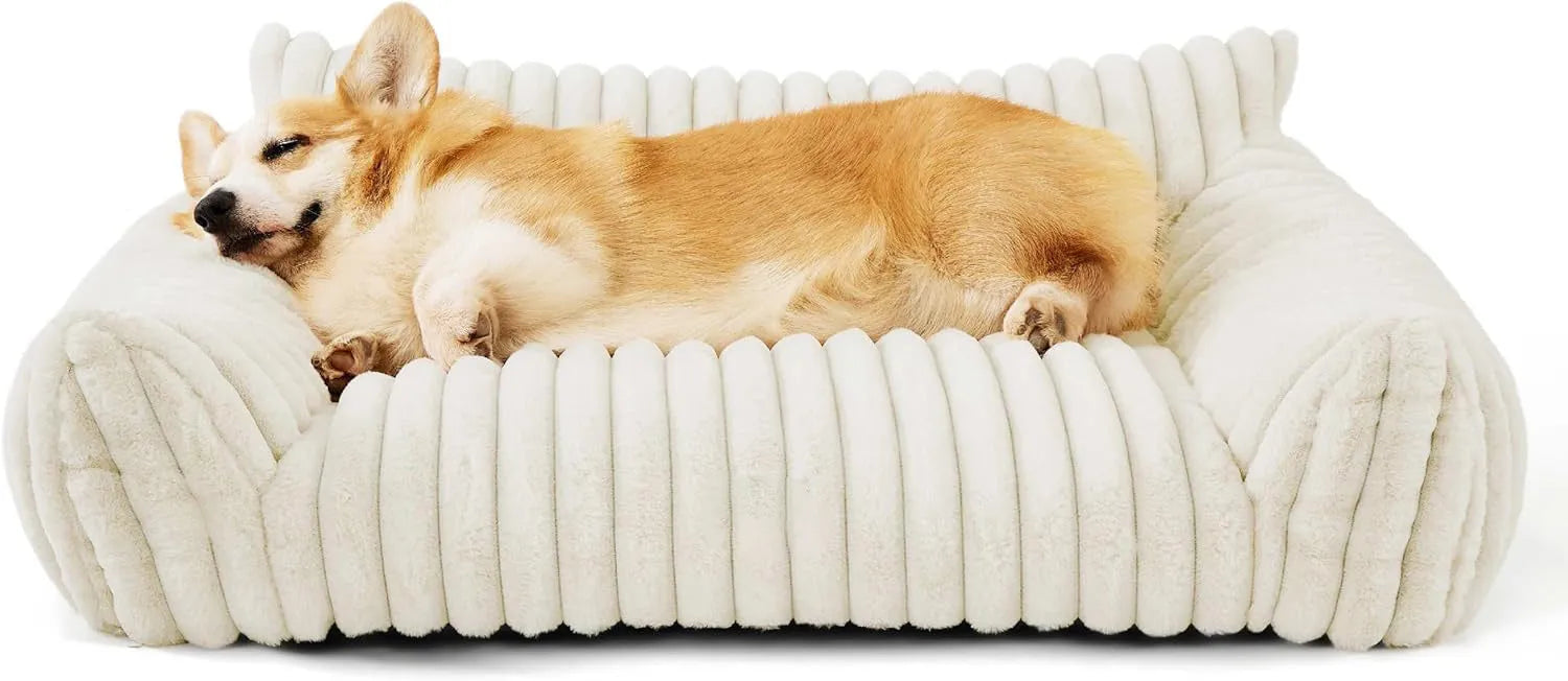 Beige corduroy cat couch with high backrest for pet support on a wooden floor.