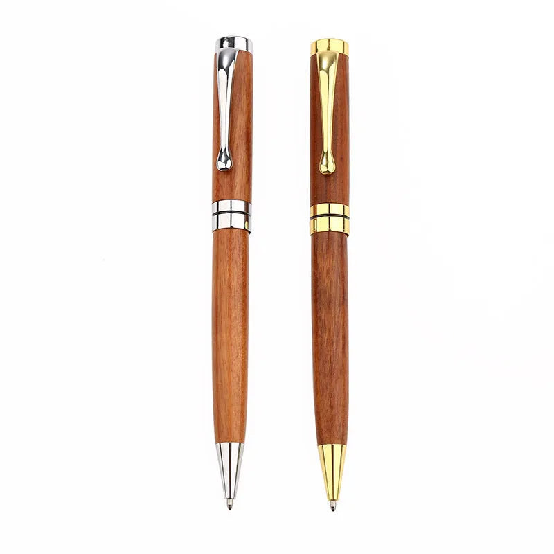 Gold metal and rosewood ballpoint pen 14cm long with cap