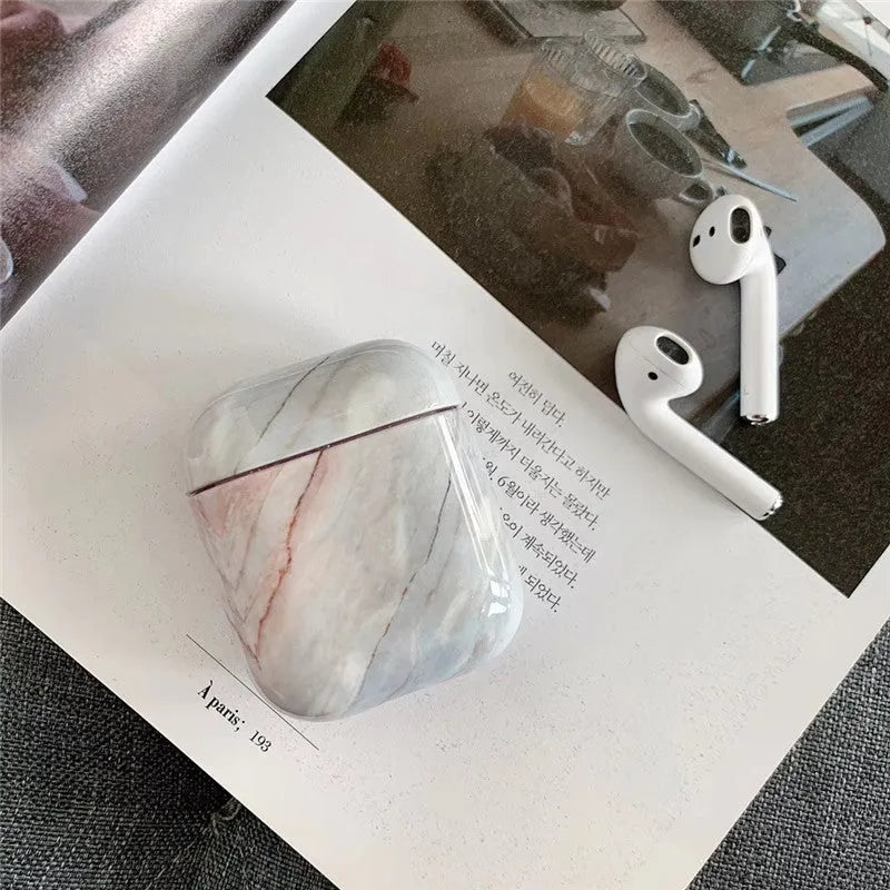 Hard white marble protective case for Apple AirPods 1 and 2 charging box.