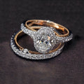 Genuine 925 sterling silver ring set with oval white sapphire and two-tone 14K rose gold overlay, size options 6-10