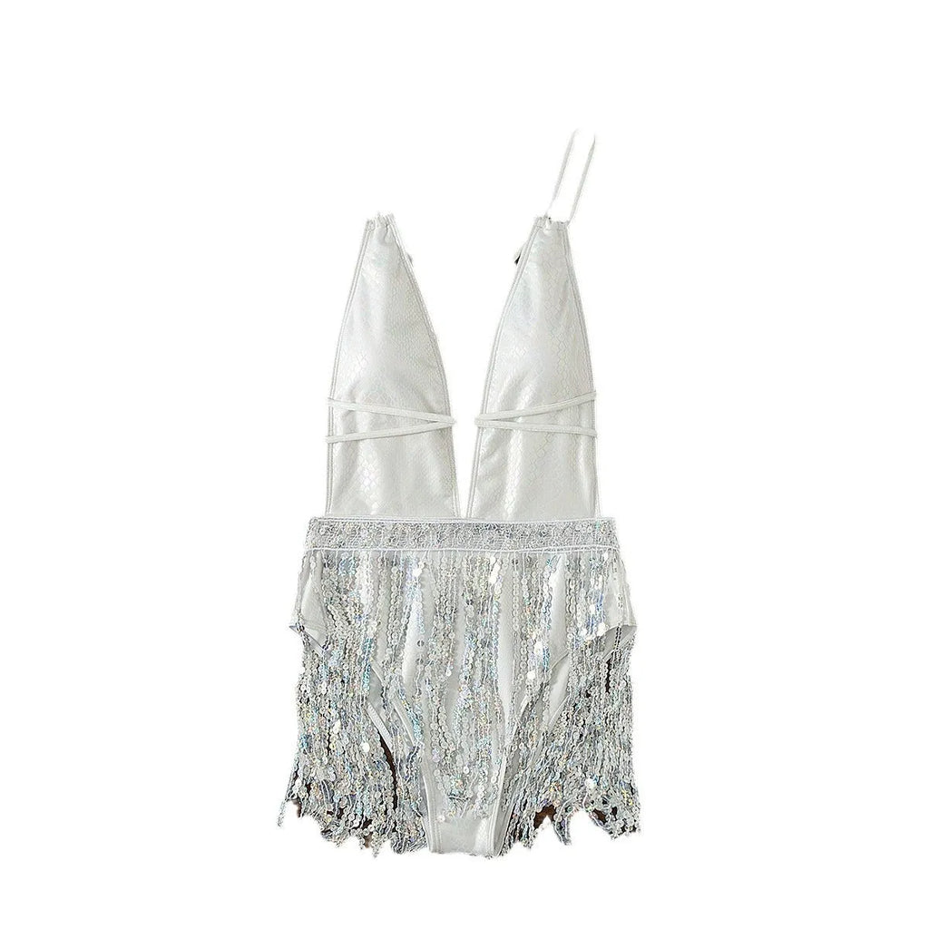 White deep V-neck one-piece swimsuit with tassel detail on a briefs style bottom