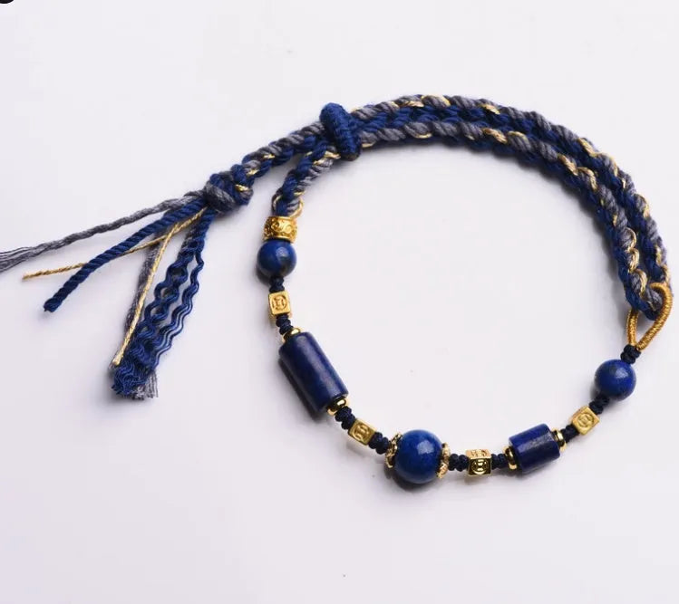 Hand-woven flexible wire watch band in ethnic style, showing Lapis Lazuli and Hongfei Ebony colour options.