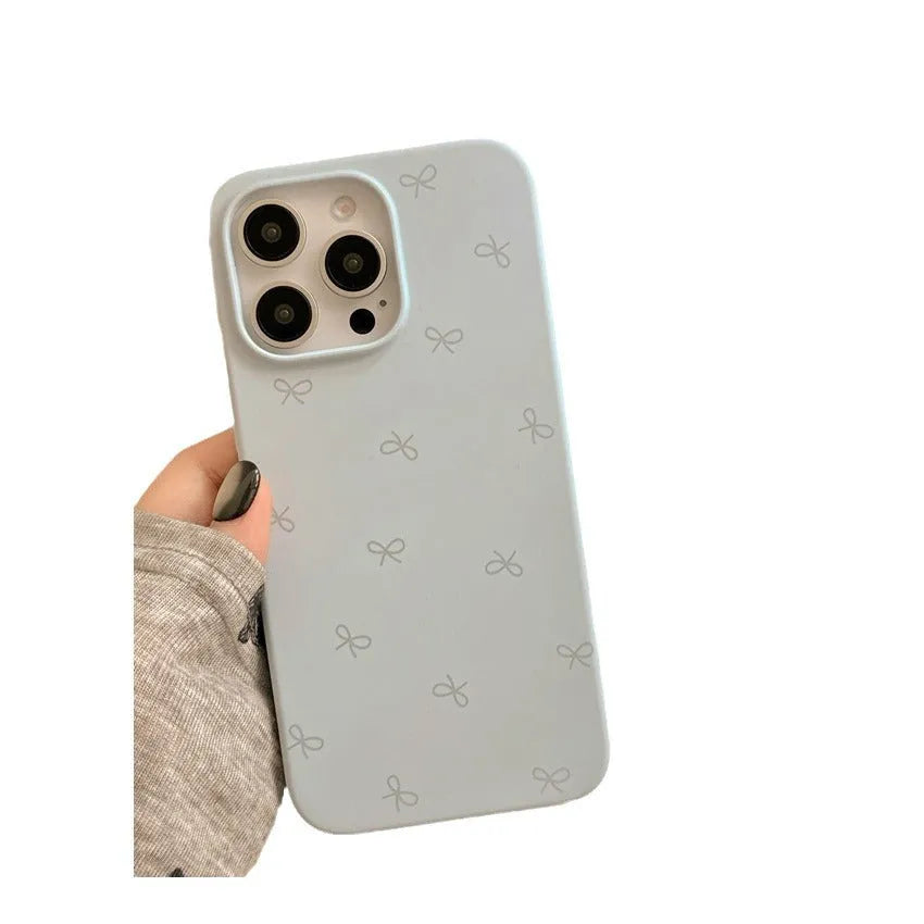 Liquid silicone phone case with bow design in antique white, shockproof, for iPhone 13 Pro Max