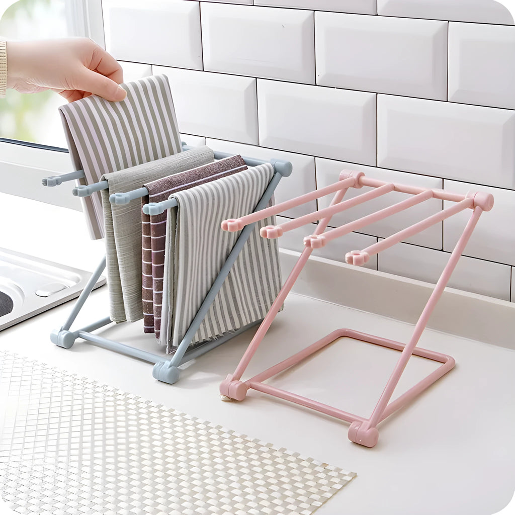 Foldable vertical dishcloth shelf in light blue with punch-free installation for kitchen organisation.