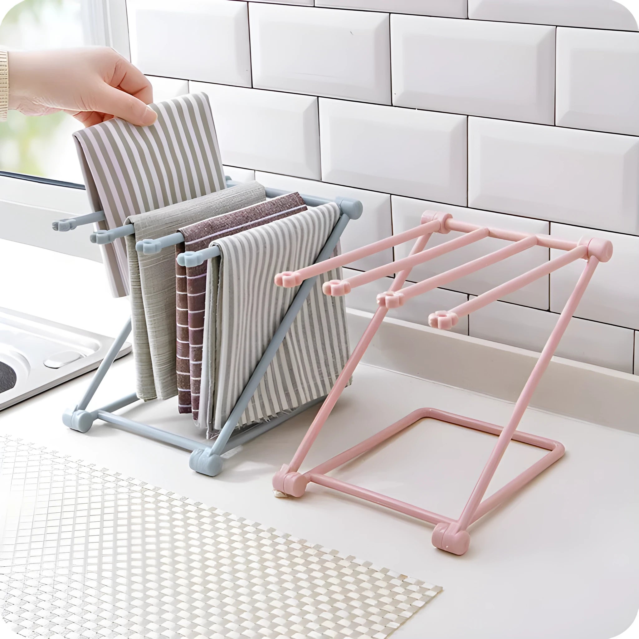 Foldable vertical dishcloth shelf in light blue with punch-free installation for kitchen organisation.