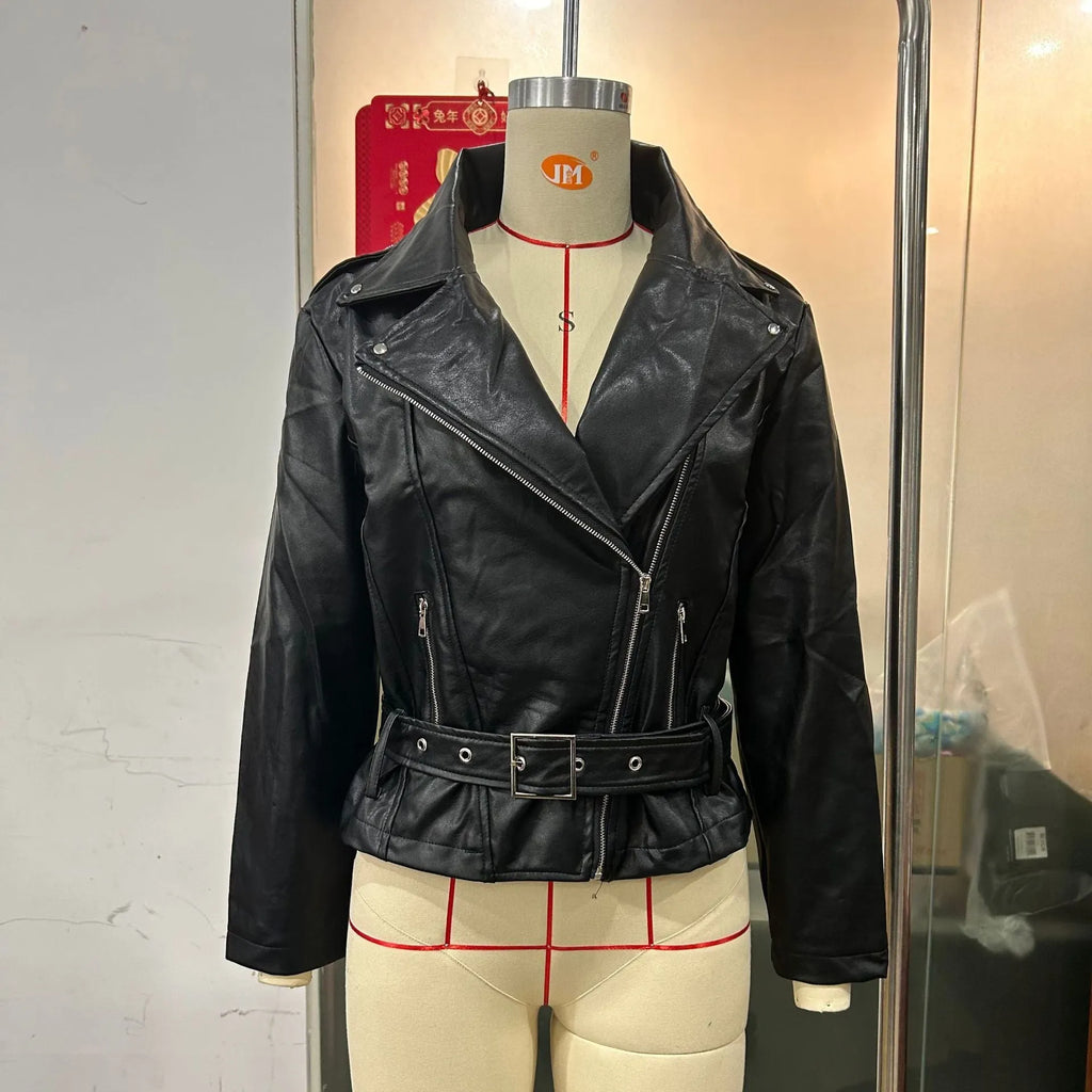 Black punk-style jacket with a drawstring waist and a soft Peter Pan collar on a hanger.