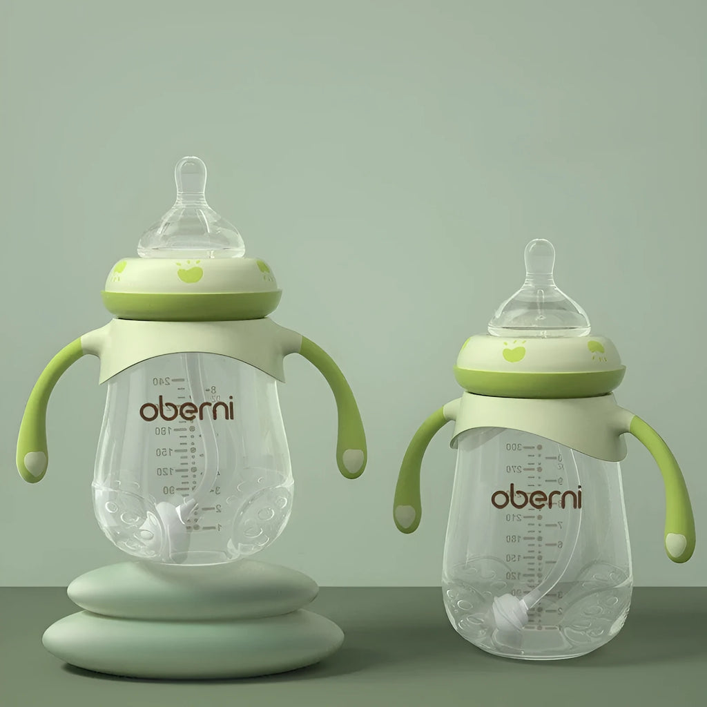 Blue wide calibre baby bottle with handle, showing gourd shape and anti-colic teat.