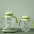 Blue wide calibre baby bottle with handle, showing gourd shape and anti-colic teat.