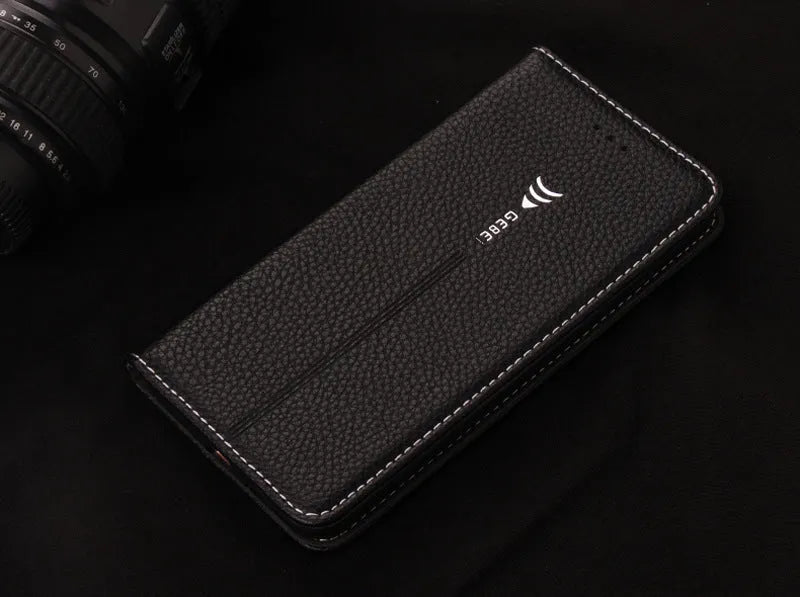 Black PU leather wallet phone case for iPhone with multiple card slots open.
