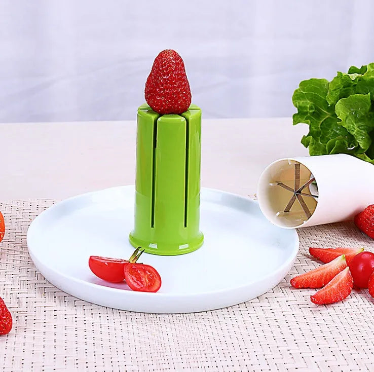 White vegetable cutter tool with six stainless steel blades for slicing cucumbers and carrots
