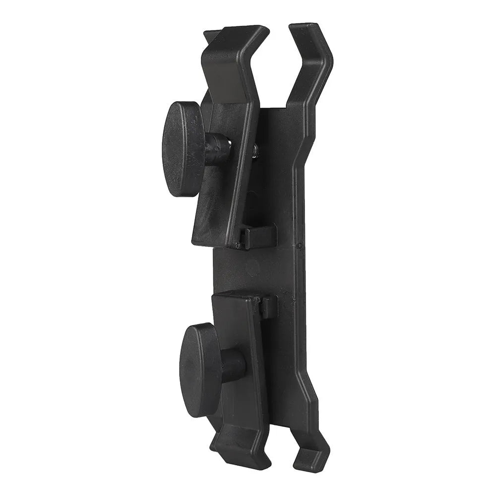 Black ABS plastic umbrella clip mounted on a camera tripod head.