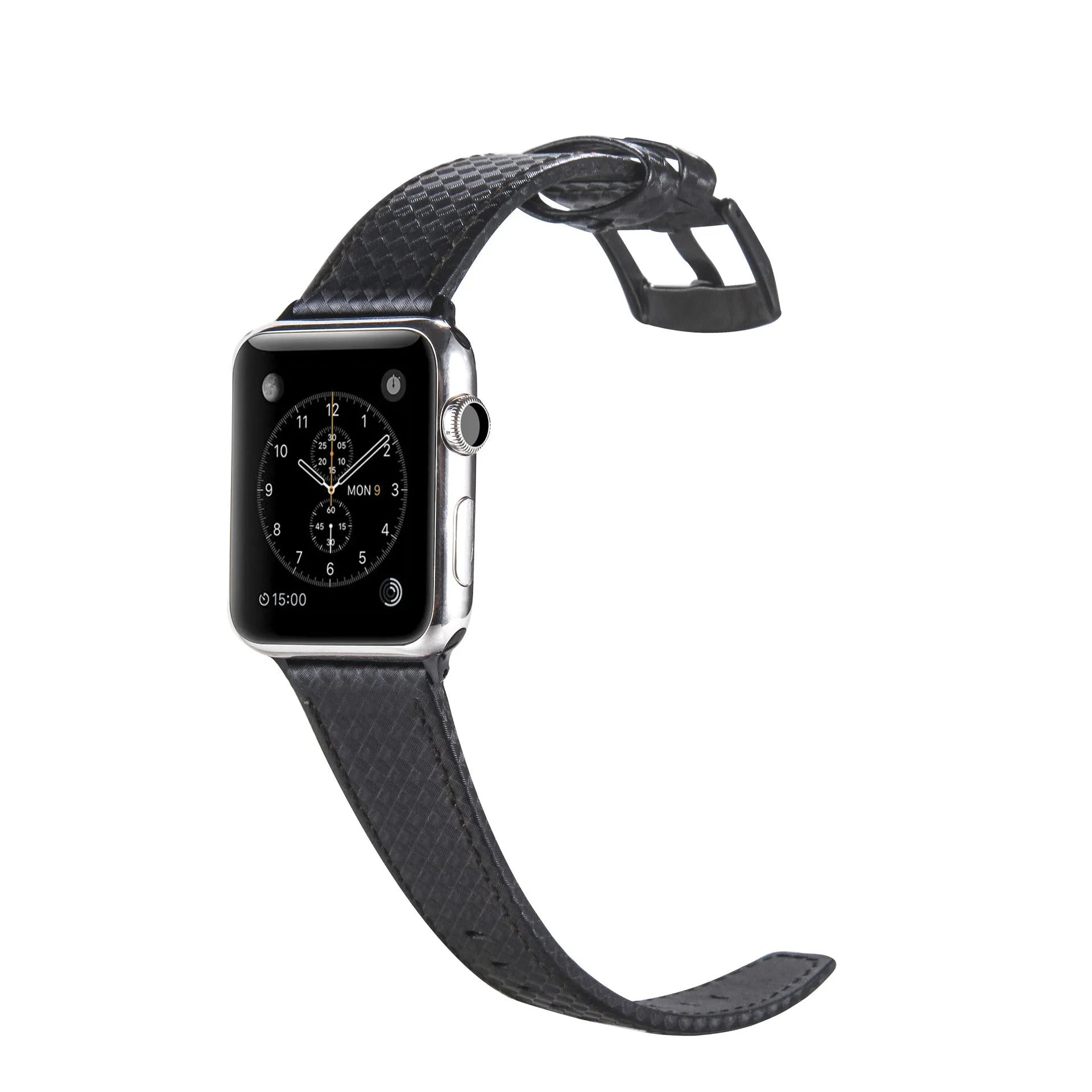 Leather and carbon fibre Apple Watch strap with red stitching next to a black PC case with carbon fibre pattern.
