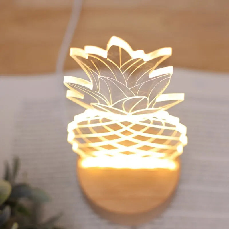 Cartoon pineapple-shaped bedside night light with wooden base and acrylic shade, showing dimmer switch and USB cable.
