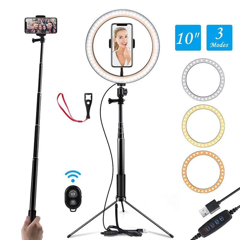 Black aluminium selfie stick tripod extended next to an iPhone, showing its five-section telescopic design.