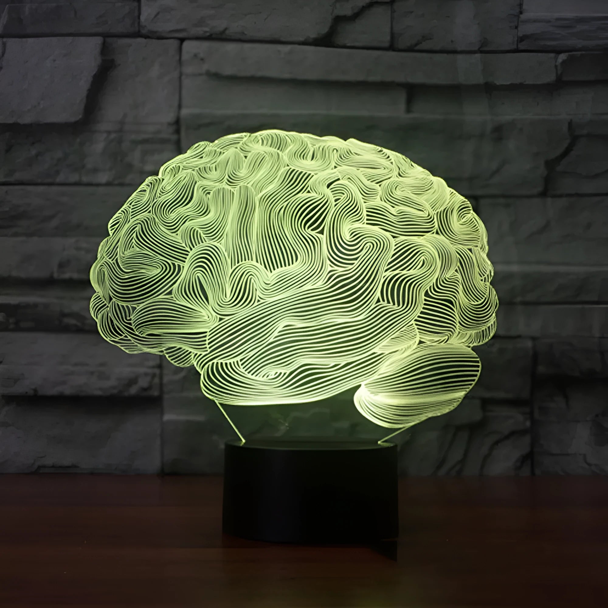 3D brain design acrylic LED lamp with colour changing lights on a black ABS base.