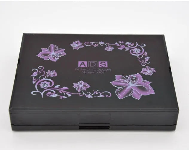 Three-layer makeup box set open showing 24 colour eyeshadow, 8 colour lipstick, 4 colour blush, powder cakes and mirror