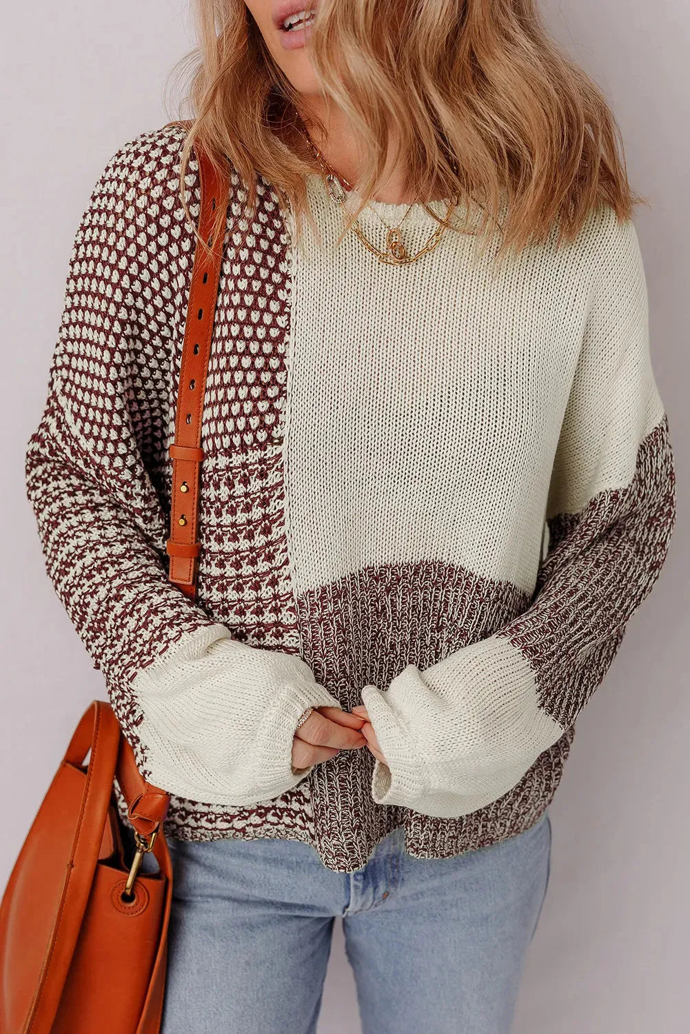 Dark khaki loose drop shoulder sweater with a colour block back panel and tie detail.