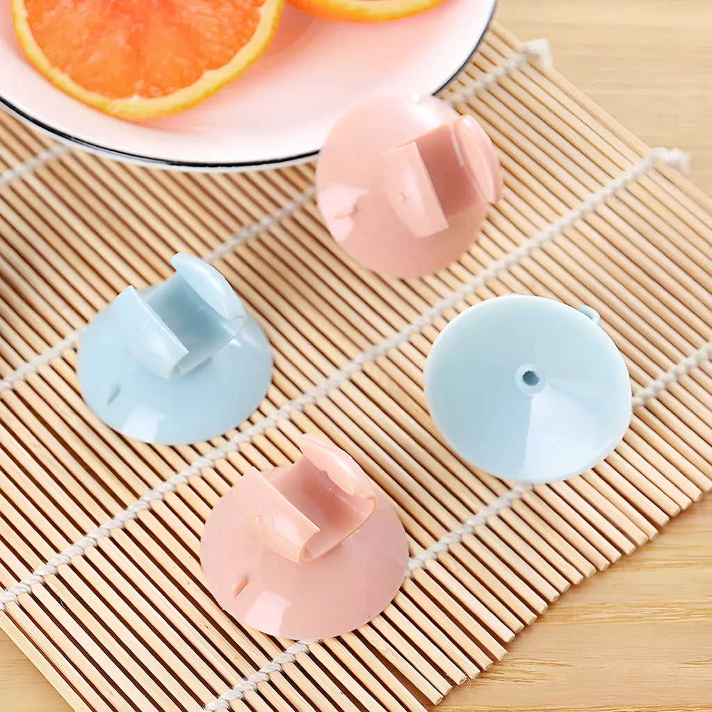 PVC rice scoop 19cm with suction cup holder in blue mounted on a white wall