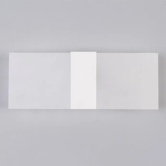 Modern acrylic LED wall lamp in black gold or silver with dual warm white light colours