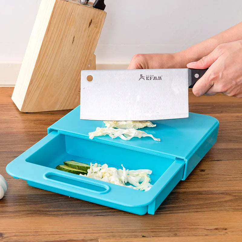 3-in-1 multi-purpose cutting board with colander in blue, showing integrated drainer and ergonomic handles