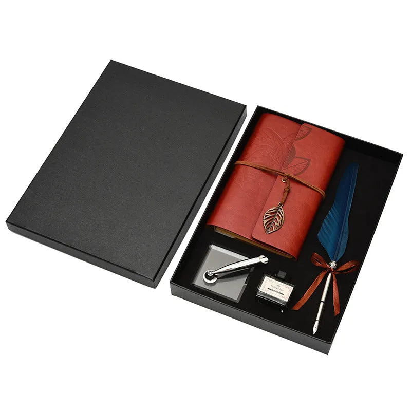 Feather dip pen gift set with copper pen, ink bottle, acrylic base, and antique book in box