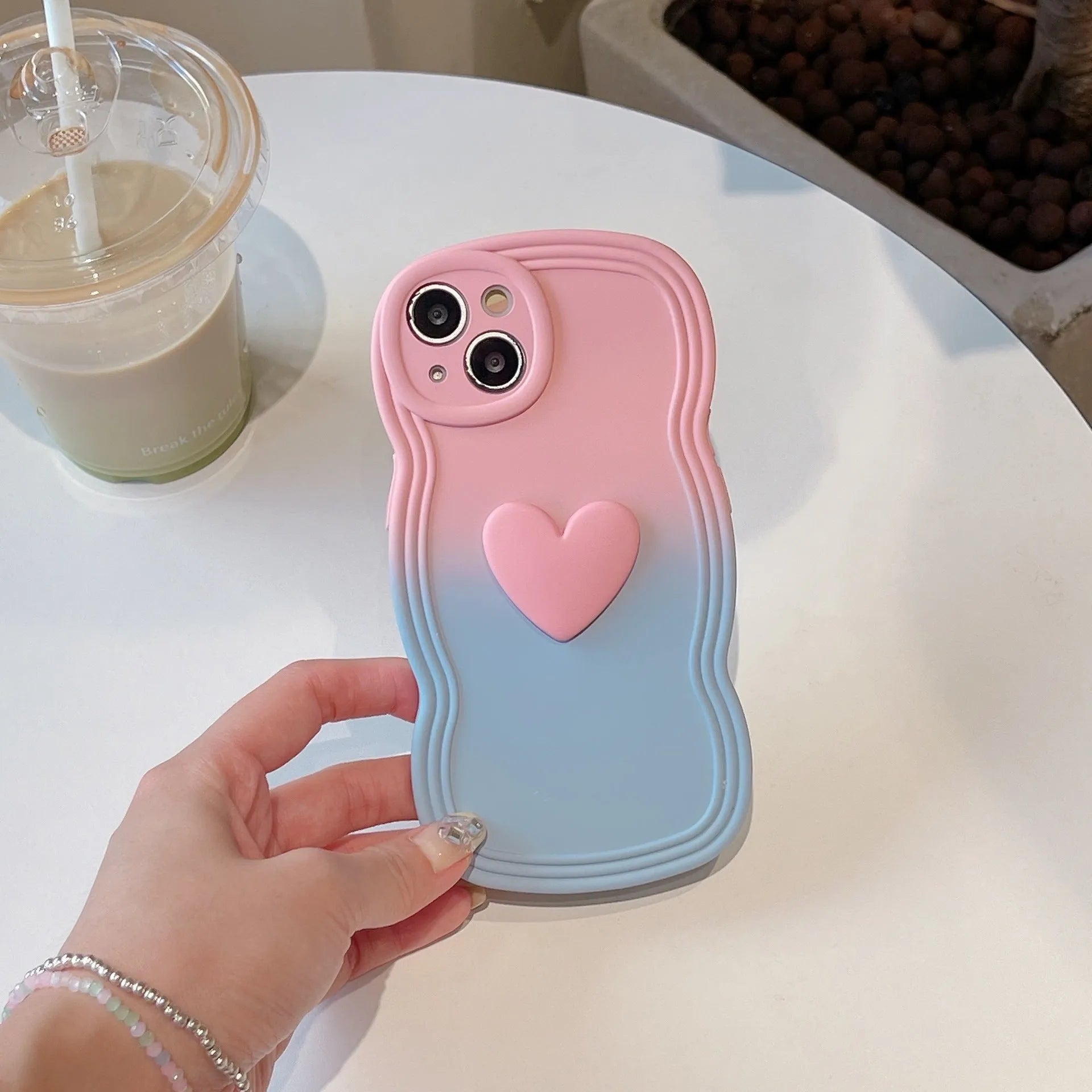 Liquid silicone love heart wavy edge phone case in red gradient black for iPhone 14 Pro Max