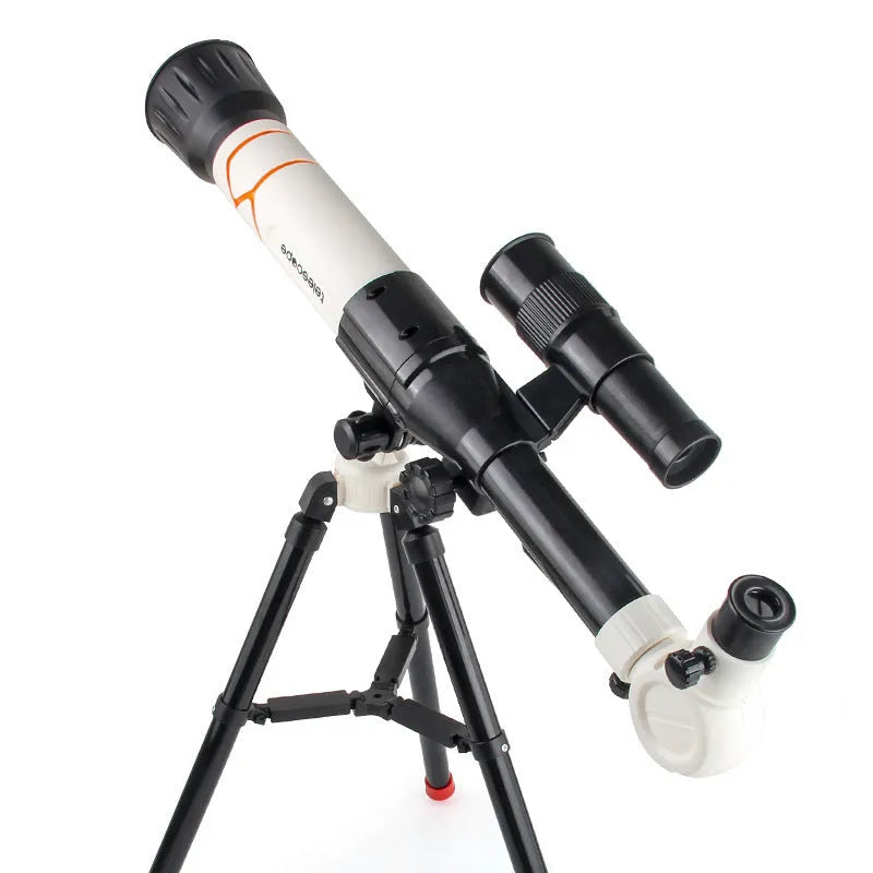 White and yellow plastic 150X kids astronomical telescope on a tripod.