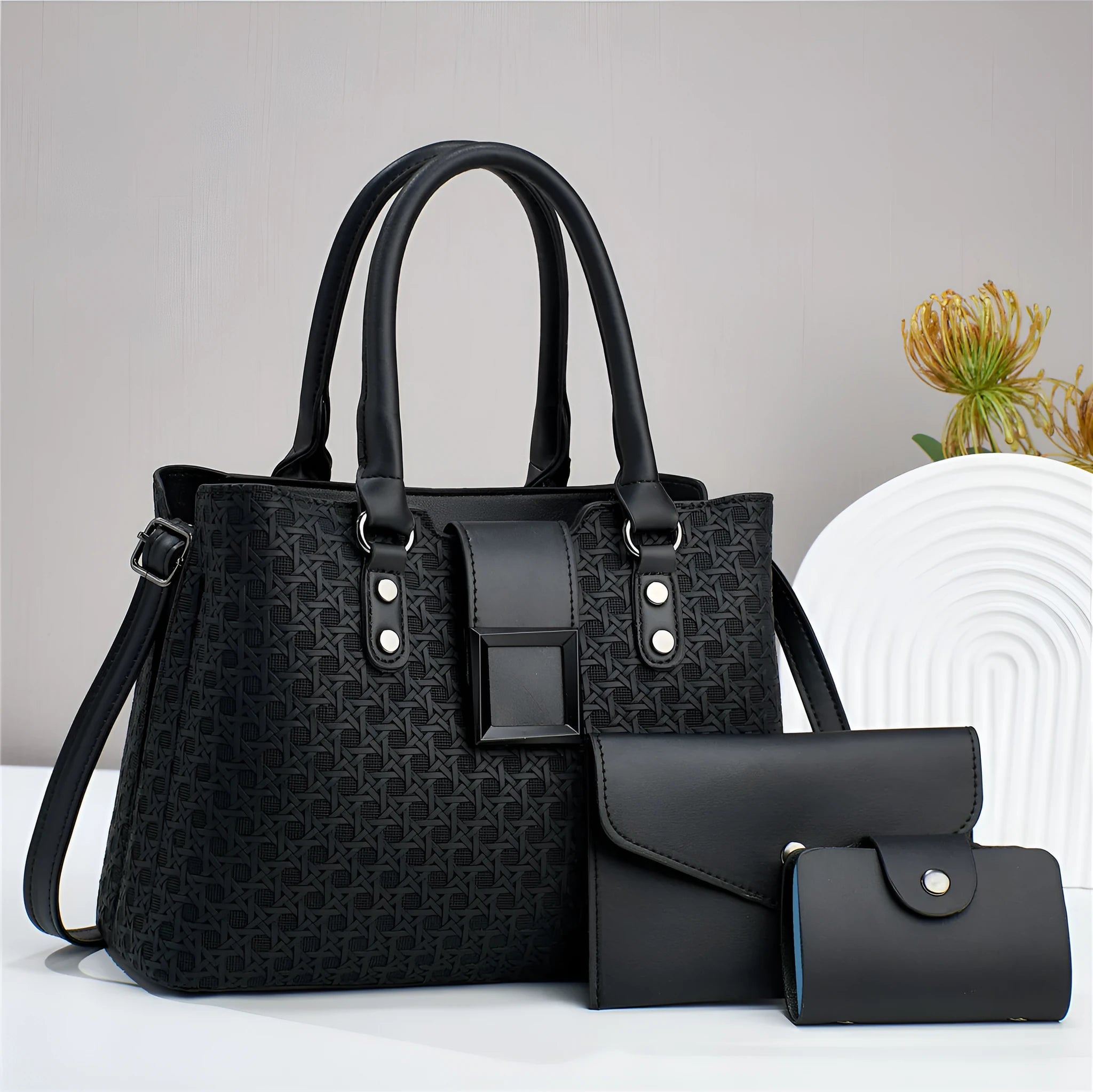 Three-piece women's crossbody bag set in textured PU leather with woven detailing in seven colour options