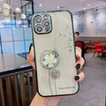 Green 3D floral design iPhone case with a rotating kickstand extended, showing the integrated screen protector.