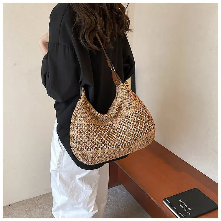 Women's khaki straw cross body bag with sandwich pocket showing horizontal square design