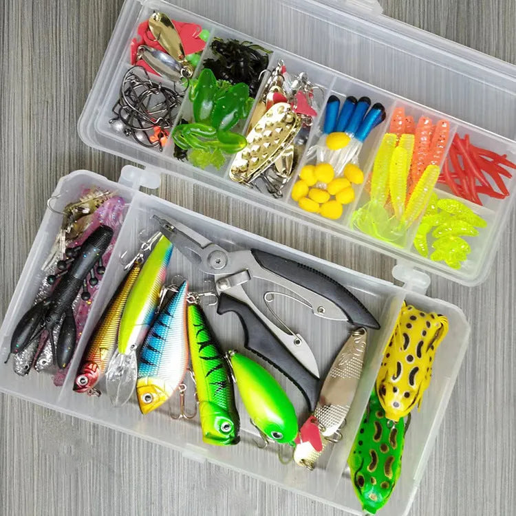 Fishing lure collection showing metal hard mino baits with sequins, plastic lures, fishhooks and fishing pliers
