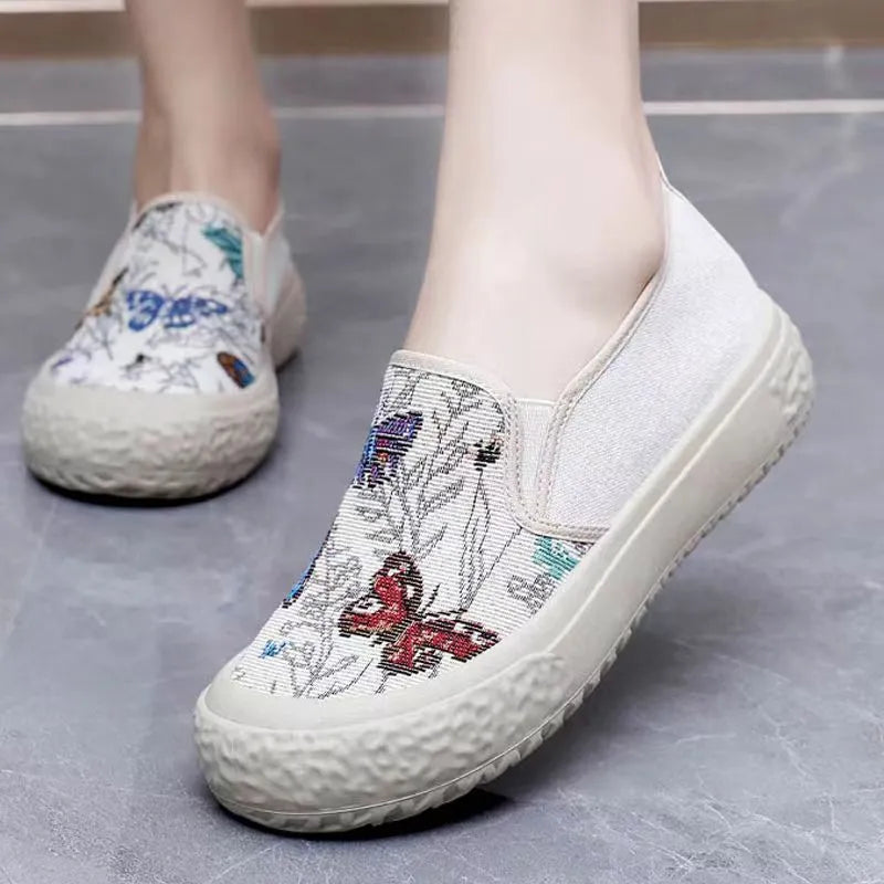 Old Beijing women's canvas slip-on shoes with soft plastic soles in black and white colour options