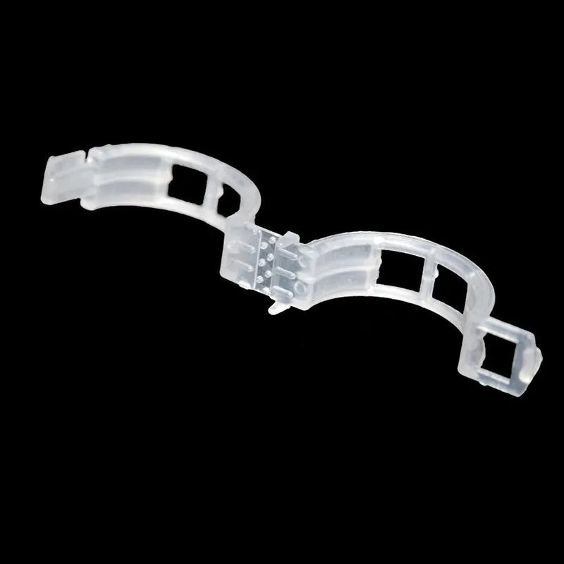A pack of 50 green plastic garden plant grafting clips for securing tomato stems and tree twigs.