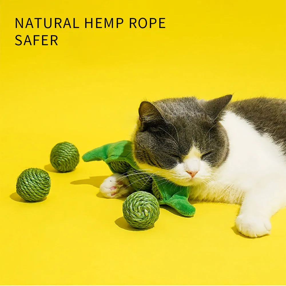 Three green sisal rope cat toy balls with rustling soundstone next to pea pod storage bag