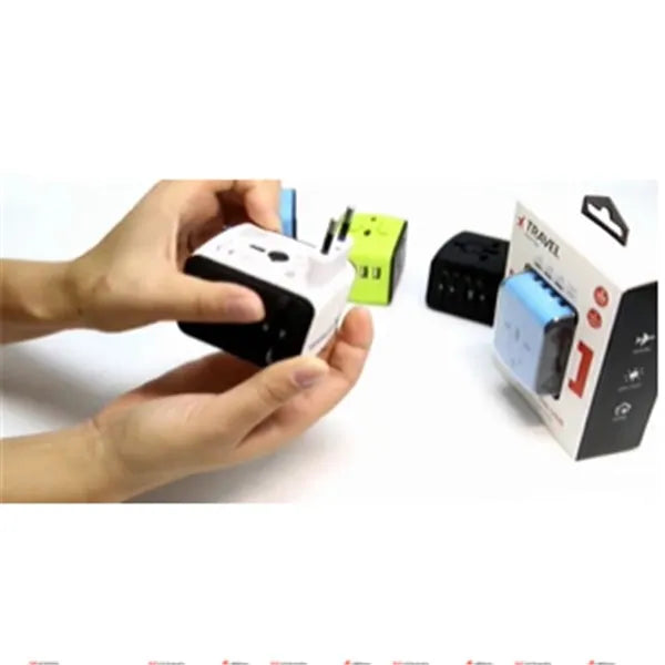 Multi-function travel socket adapter with USB charger, PC shell, black, 66x53x52mm, 4 socket holes for global use