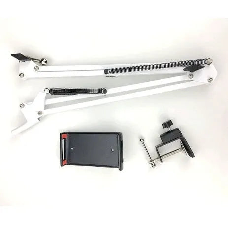 A black adjustable stand holding a mobile phone on a table.