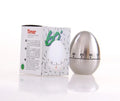 Stainless steel egg-shaped mechanical kitchen timer on a kitchen countertop