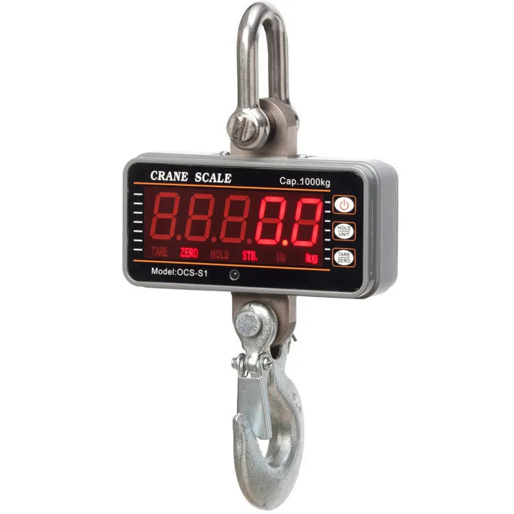 Orange electronic crane scale with digital display, shown suspended from a hook.