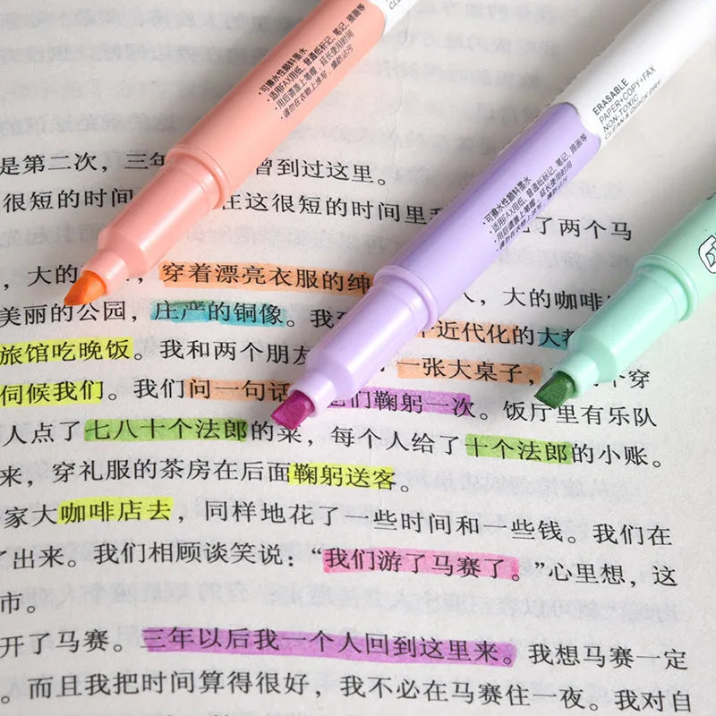 Set of six double-headed fluorescent graffiti marker pens with plastic shells and assorted colours