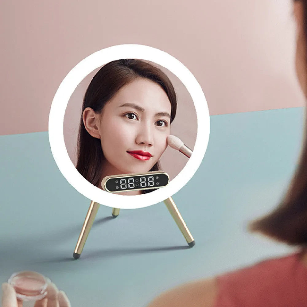 Multi-function LED mirror alarm clock with wireless charger and Bluetooth speaker in white, showing clock display and acrylic mirror surface